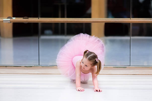 istock Little ballerina at ballet class 504896376