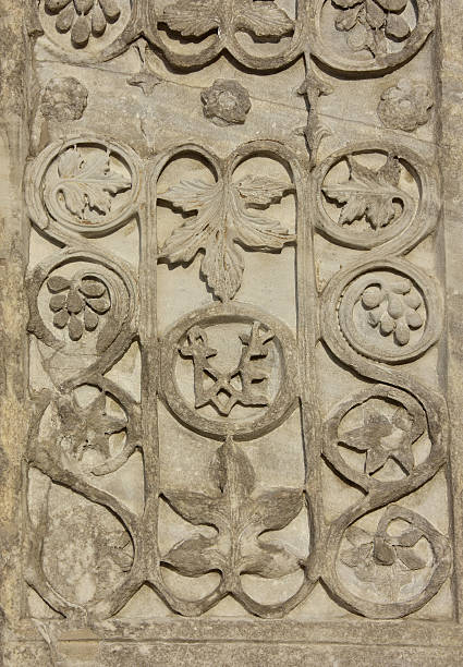 Detail of the ancient Acre pillar with sassanid motif, right in center of Saint Mark Square in Venice