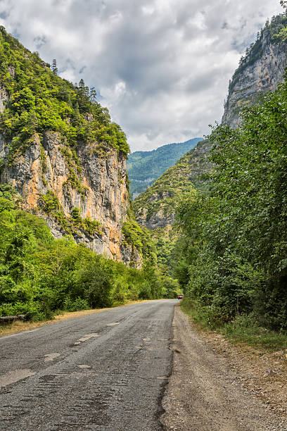 istock Asphalt road by mountain gorge 504898040