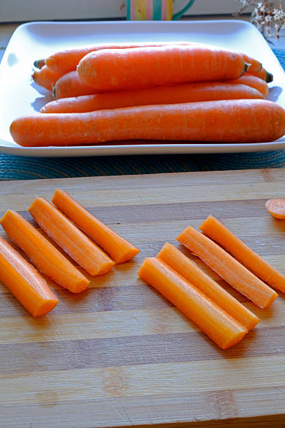 istock Fresh carrots and sticks portrait top wide 504899564