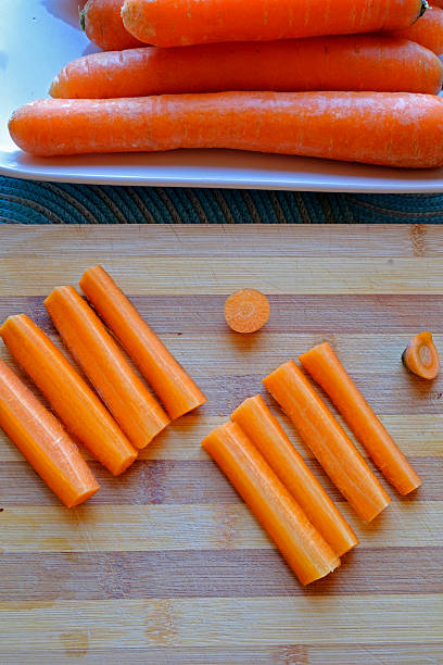 istock Fresh carrots and sticks portrait top crop 504900732