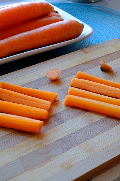 istock Fresh carrots and sticks portrait side wide 504901064