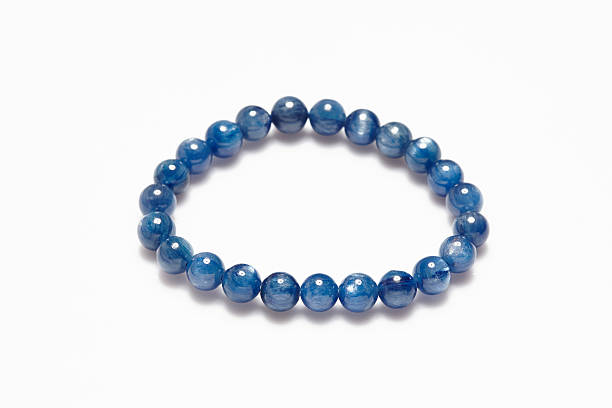istock Lucky stone bracelet on white background. 504902790