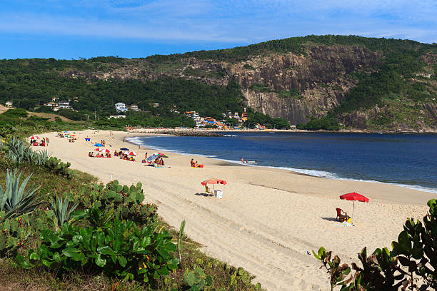 Beach Piratininga people sand sea Niteroi Rio de Janeiro stock photo