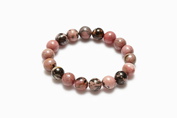 istock Lucky stone bracelet on white background. 504902816