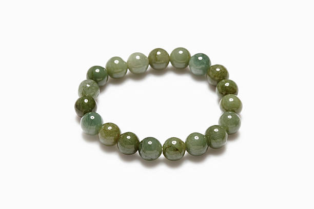 istock Lucky stone bracelet on white background. 504902878