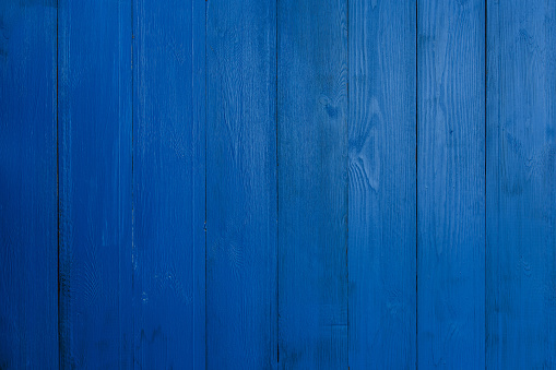 Blue wood textured background.