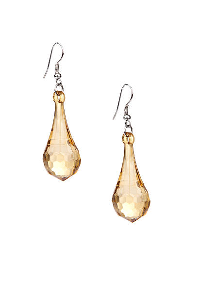 istock Pair of golden earrings 504905319