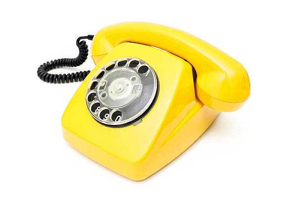 istock Yellow retro telephone isolated on white background. 504906018