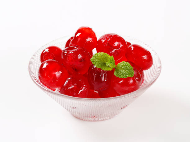 Red Glace Cherries Stoned maraschino cherries candied in sugar syrup maraschino cherry stock pictures, royalty-free photos & images