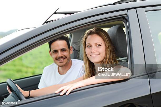 Happy Cheerful Young Couple Driving New Car Holiday Trip Summertime Stock Photo - Download Image Now