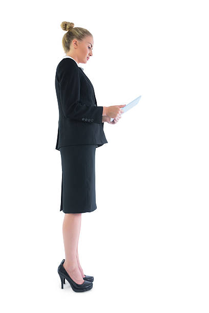istock Side view of smart attractive businesswoman using her tablet 504908021