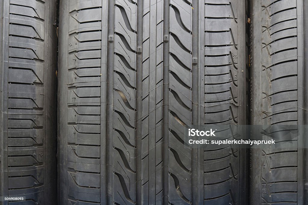 Close up on a tire on a dark background. Abandoned Stock Photo