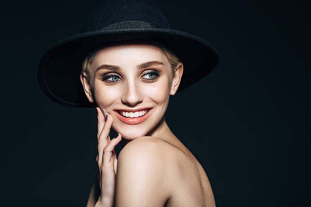 Beautiful girl with make-up and hat
