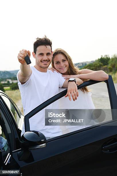 Happy Cheerful Young Couple Driving New Car Holiday Trip Summertime Stock Photo - Download Image Now