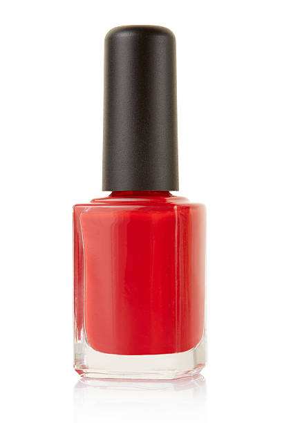 istock Red nail polish bottle 504908633