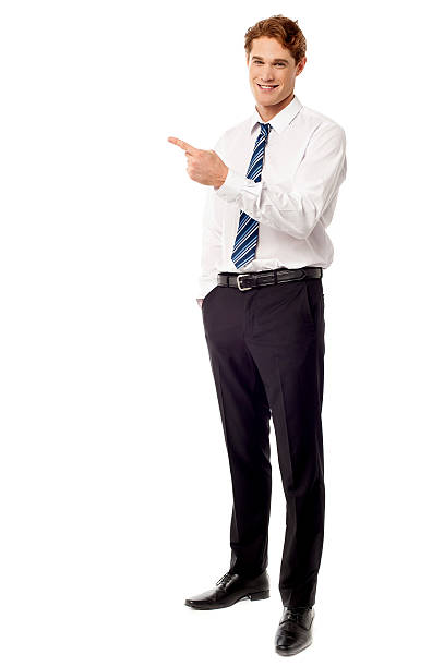 istock Young business executive pointing away 504909023