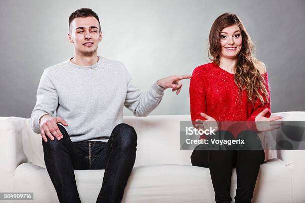 Shy Woman And Man Sitting On Sofa First Date Stock Photo - Download Image Now - Adult, Beautiful People, Beauty