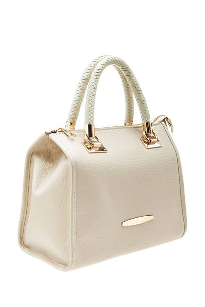 istock Creme womens bag isolated on white background. 504910264