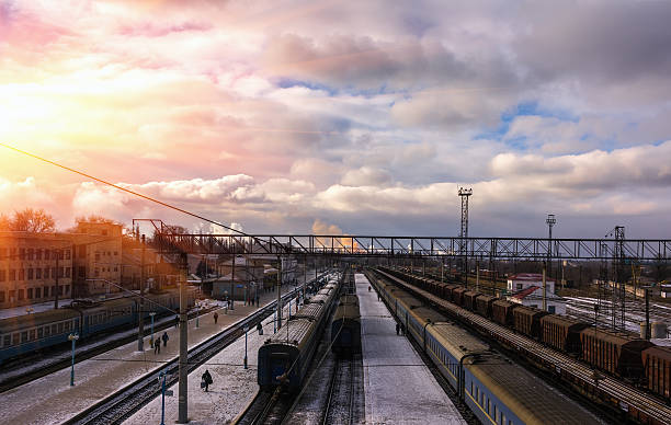 istock railway Station with trains at sunset. top view 504910270