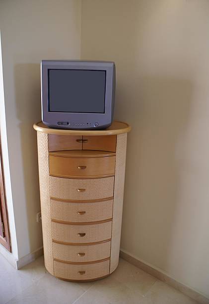 istock Television on chest of drawers 504910302
