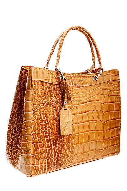 istock Brown leather womens bag isolated on white background. 504910306