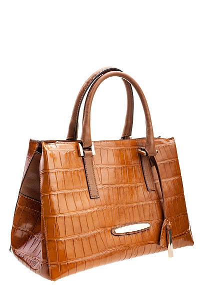 istock Brown leather womens bag isolated on white background. 504910316