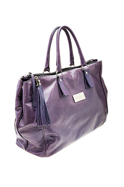 istock Violet womens bag isolated on white background. 504910462