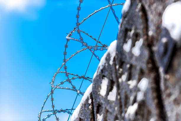 istock Dannert wired fence in winter sky 504912504
