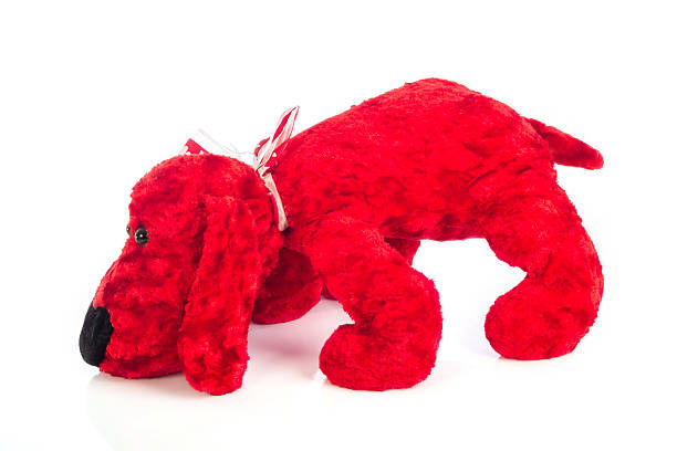 istock Cute puppy red toy 504917406