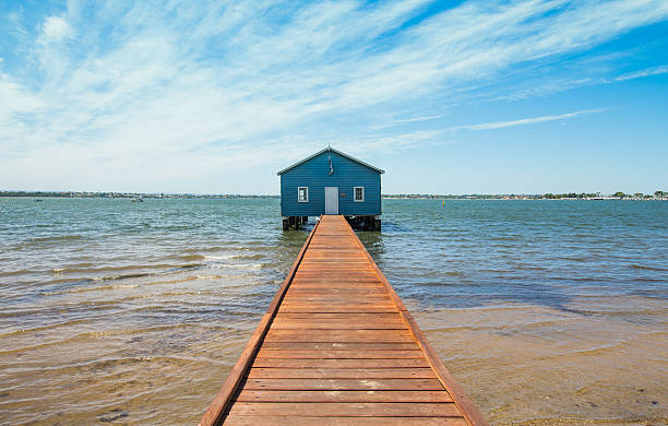istock Blue Boat Shed at the Pier 504917994