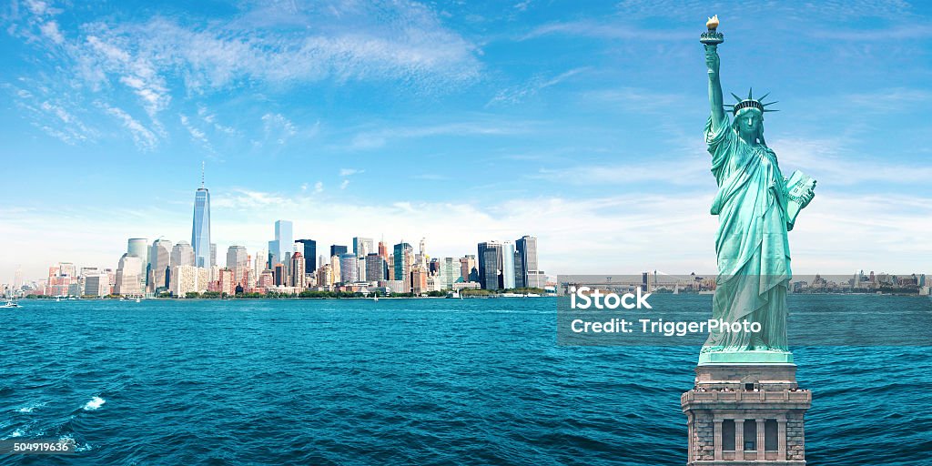 New York City Skyline, Statue of Liberty, World Trade Center Amazing NYC Skyline with Statue of Liberty, One World Trade Center, Empire State Building, Brooklyn and Manhattan Bridges. Statue of Liberty - New York City Stock Photo