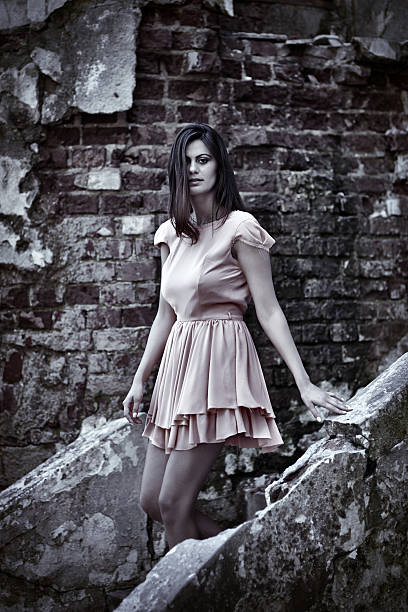 istock Young woman near ruins 504919922