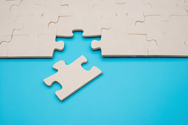 istock jigsaw puzzle with one piece separated on blue background 504921466