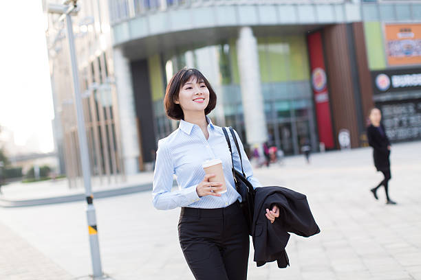 istock pretty girl outdoors shopping 504922704