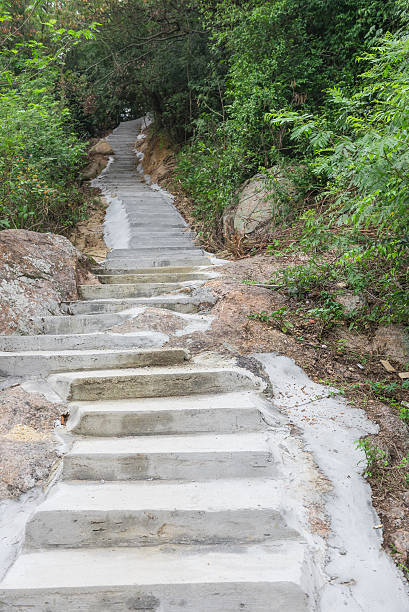 istock stairs going up to a hill 504923474