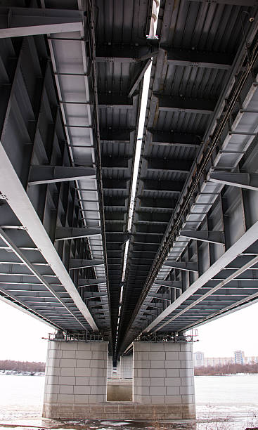 istock portrait view of a long bridge over blue sky and 504924154