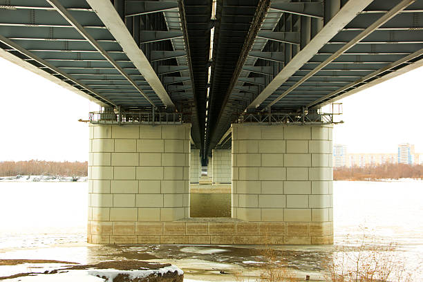 istock portrait view of a long bridge over blue sky and 504924162