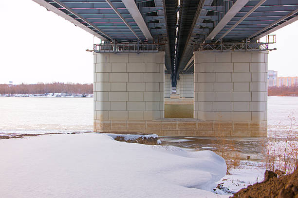 istock portrait view of a long bridge over blue sky and 504924228