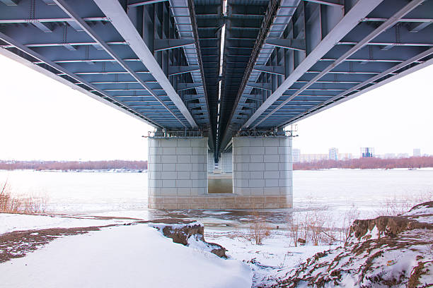 istock portrait view of a long bridge over blue sky and 504924236