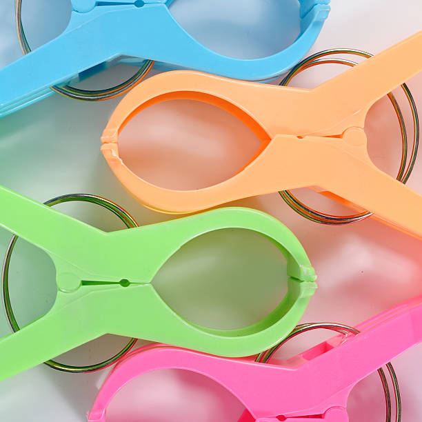 istock Close up colorful double giant clothespins 504924278