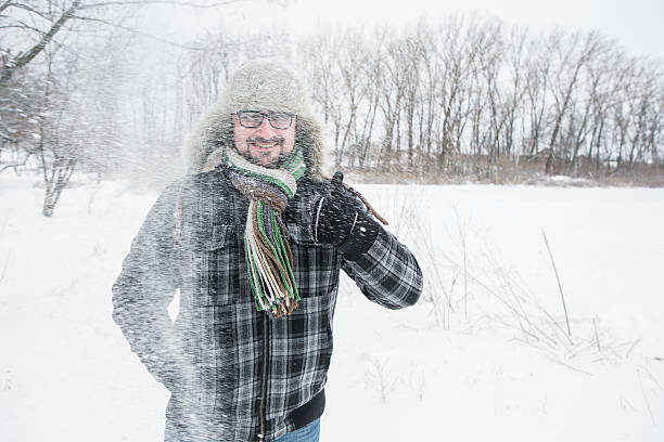 istock man in a fur hat. thumbs up 504929374
