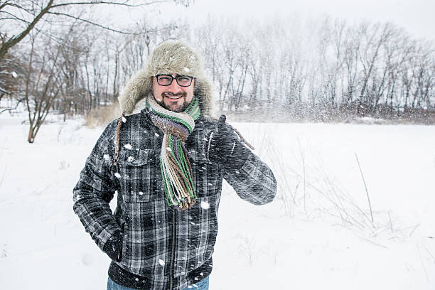 istock man in a fur hat. thumbs up 504929428
