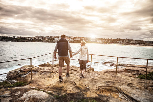 istock Couple walking on the cliffs around Bondi Beach - Sydney 504933498