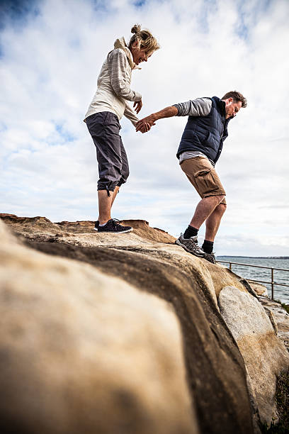 istock Couple walking on the cliffs around Bondi Beach - Sydney 504934058