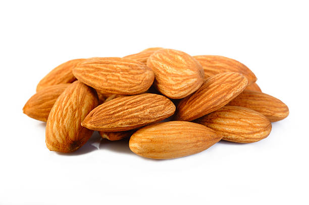 istock raw almond nuts isolated on white background 504979948