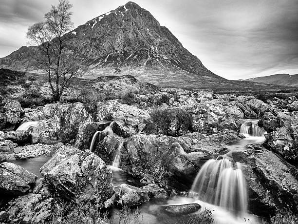 istock Waterfall with Buachaille etive mor, Glen Coe, Scotland, UK 504980676