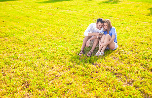 istock Caucasian Couple Sitting Embraced Together 504981220