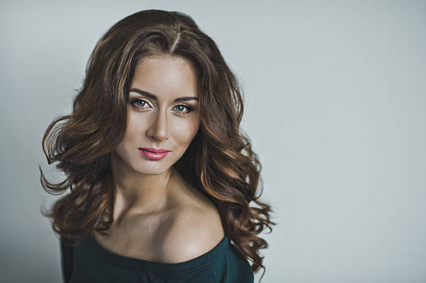 istock Charming girl with makeup and hairstyle 504982344