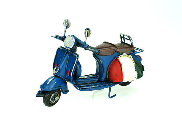 istock Retro motorcycle vintage toy isolated on white background 504984540